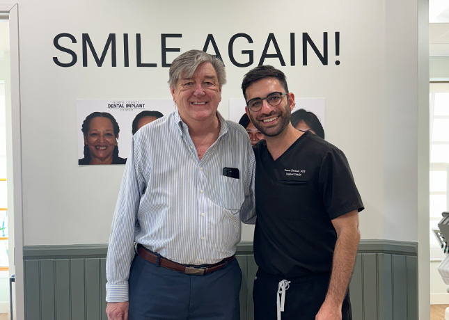 Doctor with patient smiling again